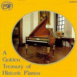 CD cover featuring a vintage piano in a room with artwork.