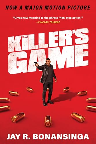 Book cover: man with gun, surrounded by bullet casings, red background.