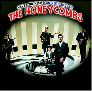 1960s band The Honeycombs posing with instruments in a circular studio.