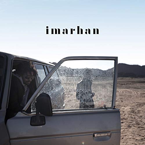 Album cover for Imarhan, featuring a person in a car and desert landscape.