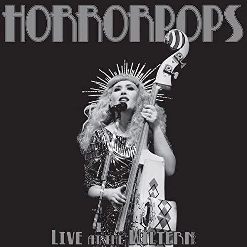 Horrorpops album cover: singer with upright bass, black and white.