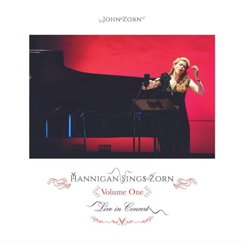 CD cover: singer at microphone with piano, red background, ornate text.