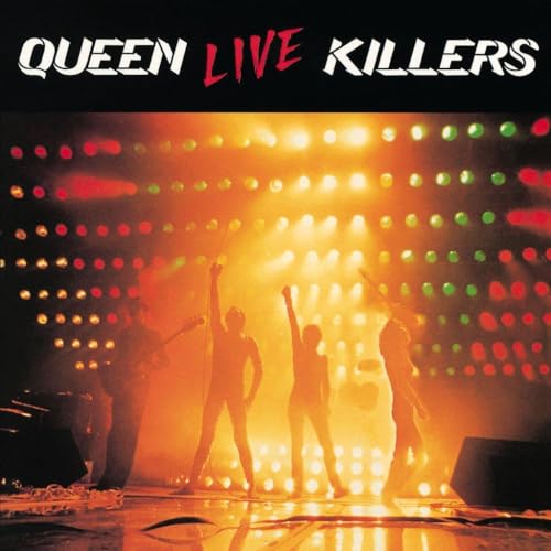 Queen band members silhouetted on stage with bright, colorful lights.