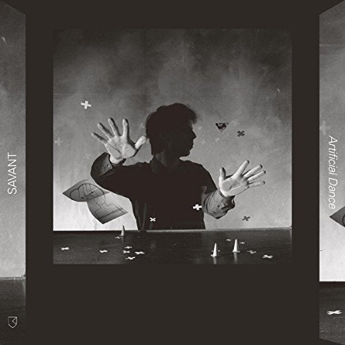 Black and white album cover featuring a person with outstretched hands.