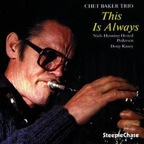 Chet Baker portrait on album cover, playing trumpet with dark background.
