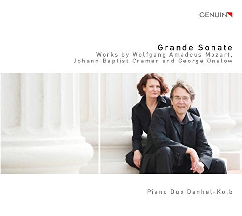 CD cover featuring a man and woman, Piano Duo Danhel-Kolb, in formal wear.