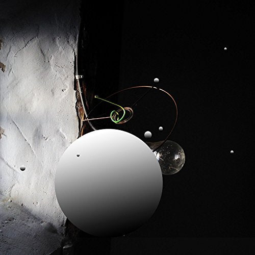 CD cover: abstract spheres and lines against a textured, dark background.