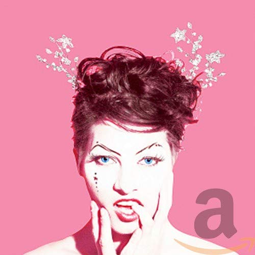 Close-up of Amanda Palmer with star-shaped floral arrangement in hair.