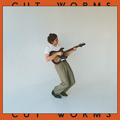 Cut Worms album cover: musician playing guitar against a pale background.