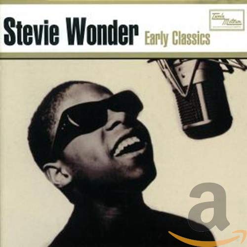 Stevie Wonder CD cover: young musician with sunglasses at a microphone.