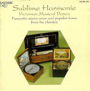 CD cover featuring antique musical boxes in a hexagonal frame.