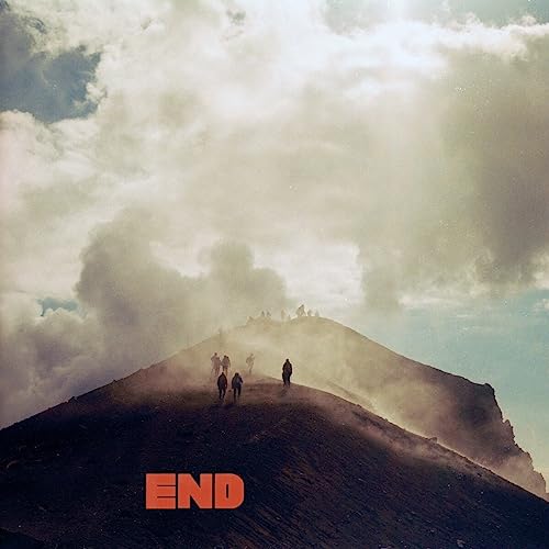 Album cover: people silhouetted on a hazy, volcanic mountainside.