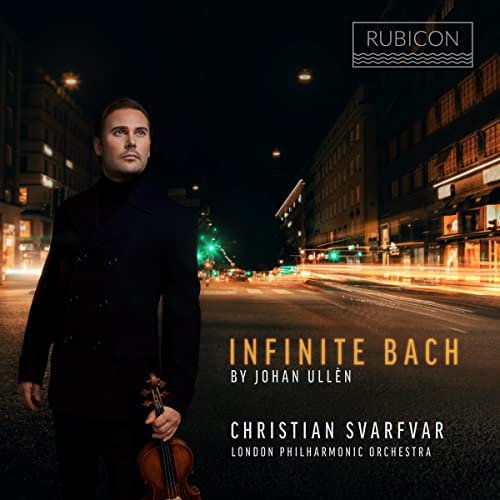CD cover: Man with violin stands on a London street at night.