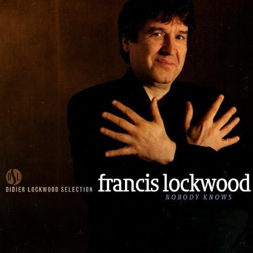 CD cover featuring portrait of Francis Lockwood with hands raised.