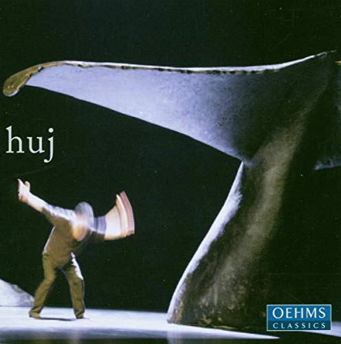 CD cover with a silhouetted figure and abstract, flowing shapes.