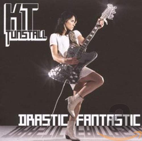 Album cover of Kt Tunstall holding an electric guitar against a dark background.