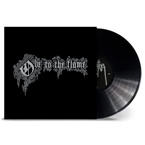 Black vinyl record with ornate silver lettering on a dark sleeve.