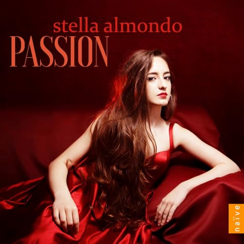CD cover: woman with long hair in a red dress, dark background.
