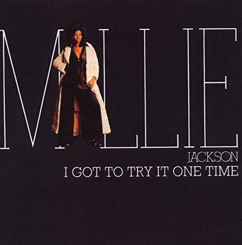 Millie Jackson album cover, portrait of singer in a robe.