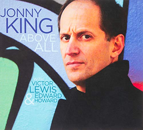 CD cover featuring portrait of Jonny King with abstract blue background.