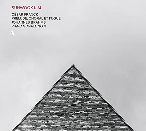 CD cover featuring a brick pyramid against a gradient background.