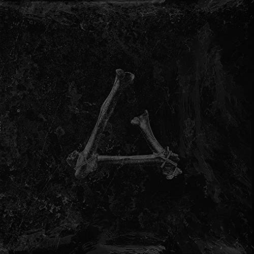 Black and white image of bones arranged in a triangular shape.