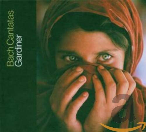 CD cover: close-up of a person with a red head covering.