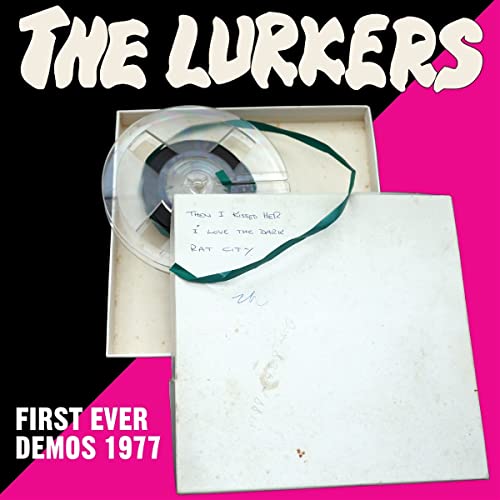 The Lurkers demo cassette and record in an open white box.