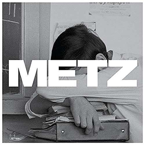 Black and white album cover for Metz, featuring a child and text.