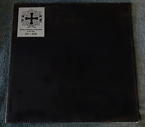 Black vinyl record with a white label featuring a cross and numbering.
