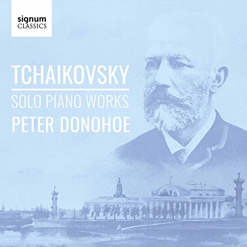 CD cover featuring a portrait of Tchaikovsky and a cityscape.