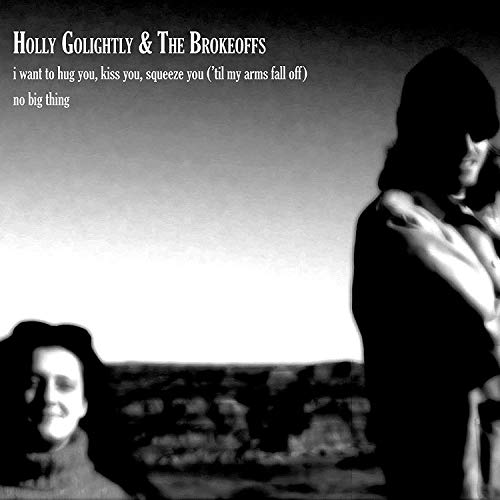 Black and white vinyl record cover with two figures in silhouette.
