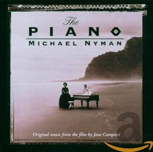 CD cover showing a woman standing by a piano on a beach.