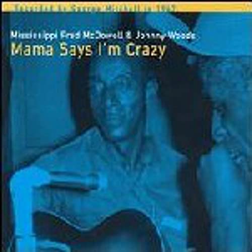 CD cover featuring Mississippi Fred McDowell playing an acoustic guitar.