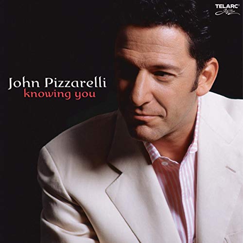 CD cover featuring a portrait of jazz musician John Pizzarelli.