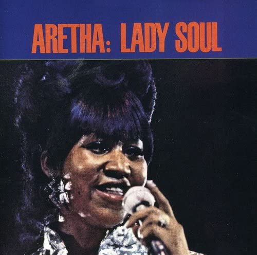 Aretha Franklin’s “Lady Soul” CD cover featuring her singing into a microphone.