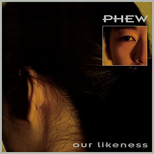 Vinyl record cover featuring a close-up of a person’s face and hair.