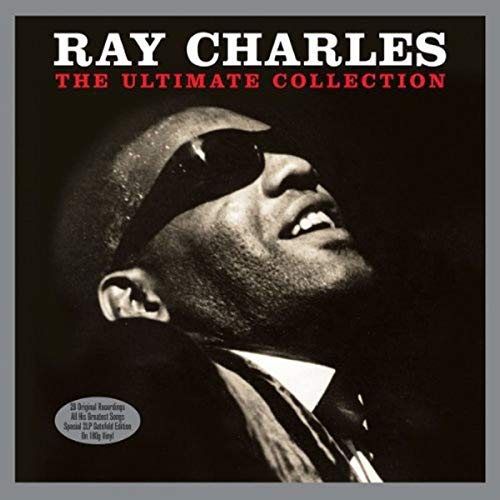 Black and white portrait of Ray Charles wearing sunglasses on a vinyl record cover.