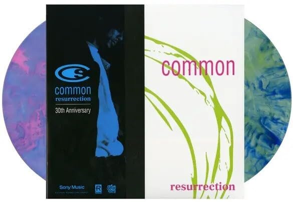 Common's 'Resurrection' vinyl record with colorful marbled discs and album art.