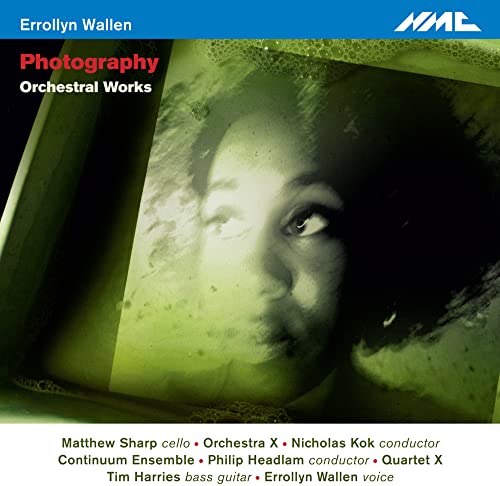 CD cover featuring a blurred portrait with green and blue tones.