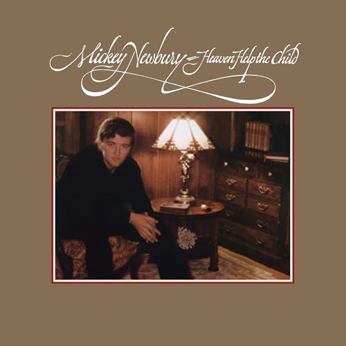 Mickey Newbury album cover: portrait of a man in a room with warm lighting.