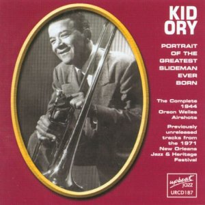 Kid Ory portrait in oval frame, holding a trombone, album cover.