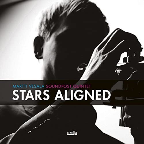 CD cover featuring a close-up of a man with a double bass.