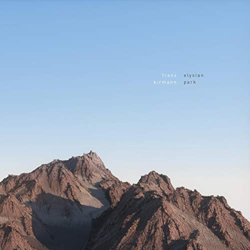 Album cover with mountains under a clear blue sky and text.