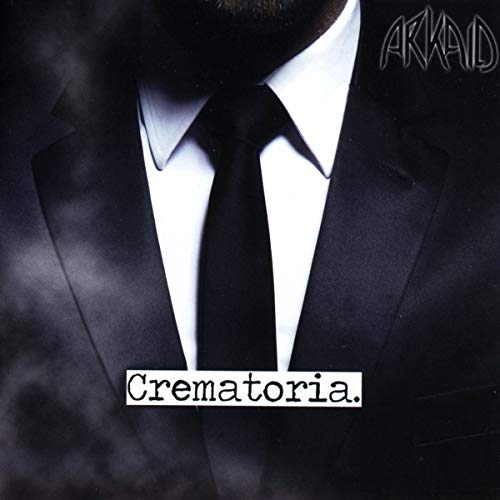 CD cover: Man in suit, dark background, text “Crematoria.”