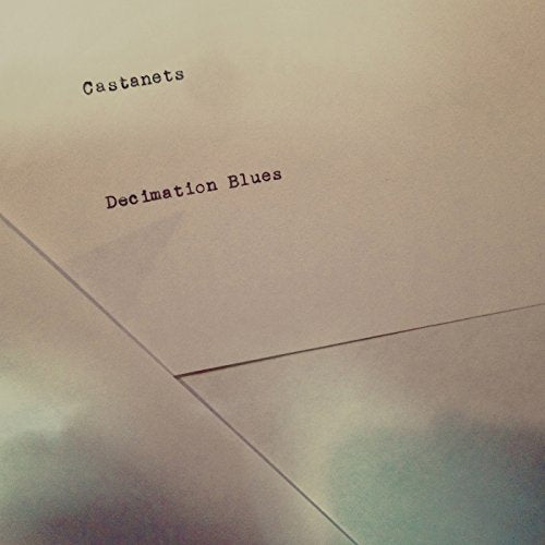 CD cover for Castanets’ “Decimation Blues” with typed text and blurred image.