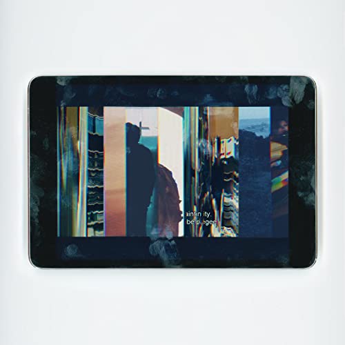 Album cover with distorted, colorful vertical bands and a silhouetted figure.