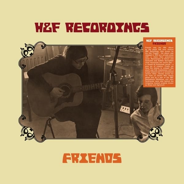 Vinyl record cover: sepia-toned photo of a man playing guitar with another man.