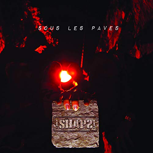 CD cover: dark, textured stone with text and a glowing hand.