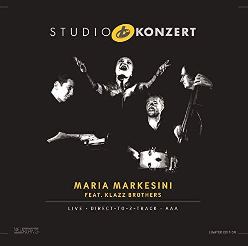 Black and white album cover featuring five musicians performing.